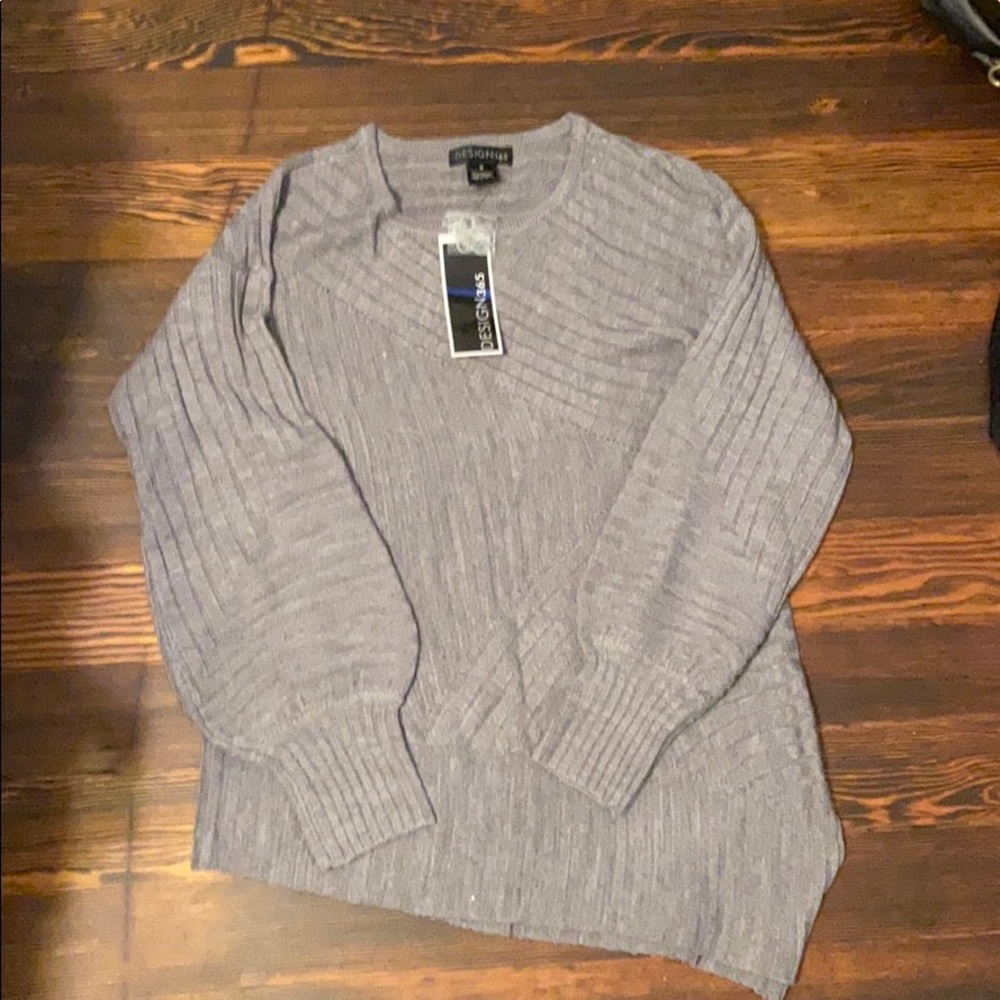 Never worn sweater from saks off